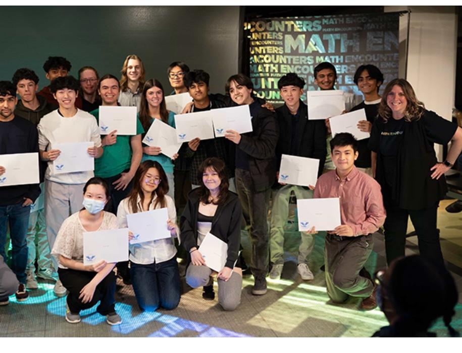 Ethan Cha engaging visitors with an interactive research demonstration